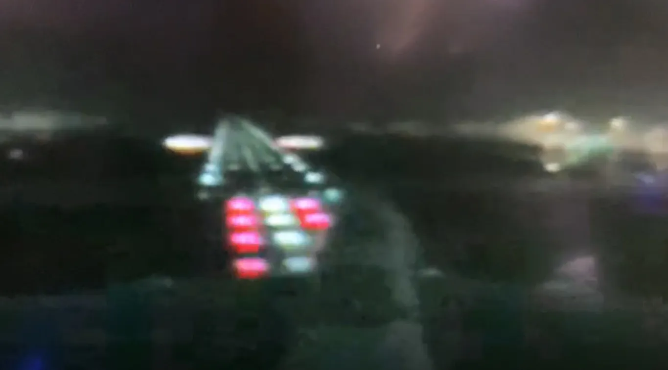 Dramatic tail view video of an Emirates A380 landing during a storm