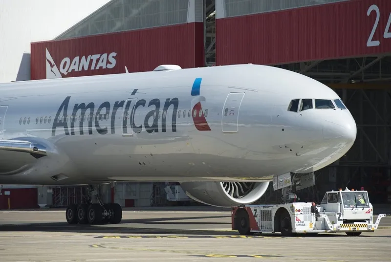 American slashes international flying by 75 percent