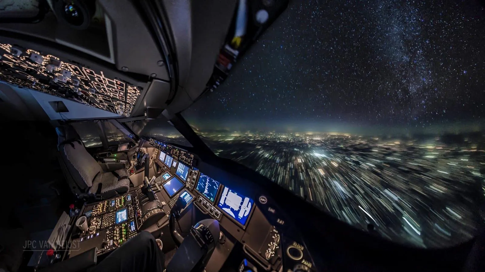 Billions of lights, billions of people from a 747 cockpit