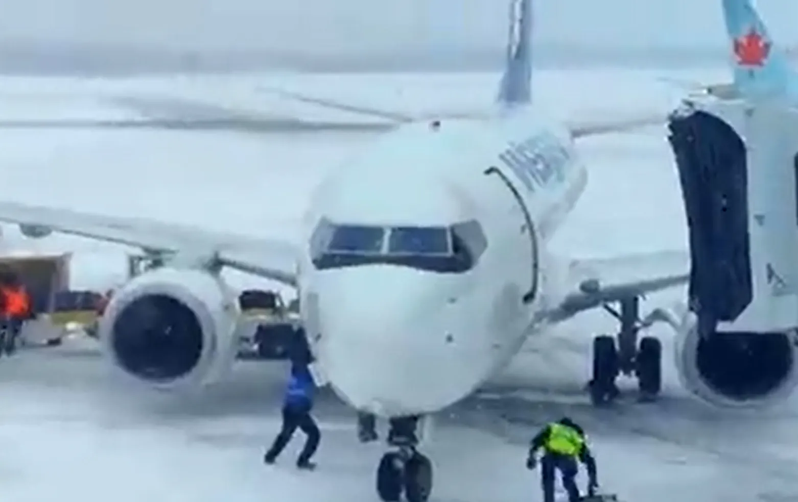 Westjet 737 blown away from its boarding gate