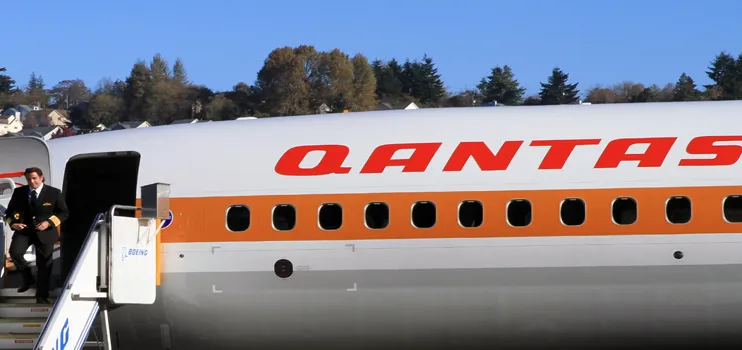 Travolta unveils Qantas retro jet