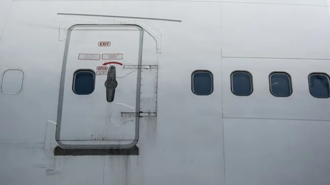 Korean Air Restrain Passenger Trying to Open Exit Door